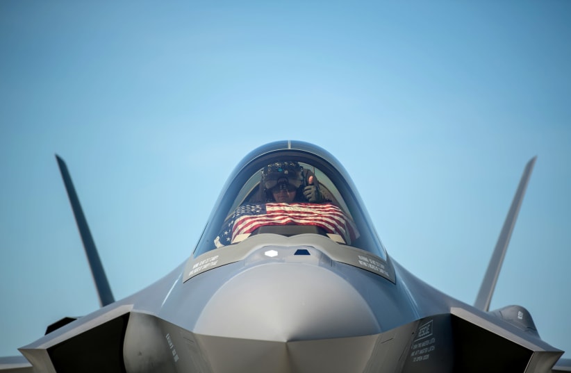An F-35 pilot prepares for take off from the Vermont Air National Guard Base with the flag of the United States, May 22, 2020 (photo credit: US AIR NATIONAL GUARD/MISS JULIE M. SHEA/HANDOUT VIA REUTERS)