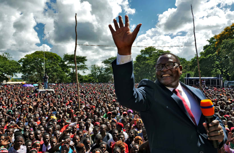 Opposition Malawi Congress Party leader Lazarus Chakwera addresses supporters after a court annulled the May 2019 presidential vote that declared Peter Mutharika a winner, in Lilongwe, Malawi, February 4, 2020 (photo credit: REUTERS/ELDSON CHAGARA)
