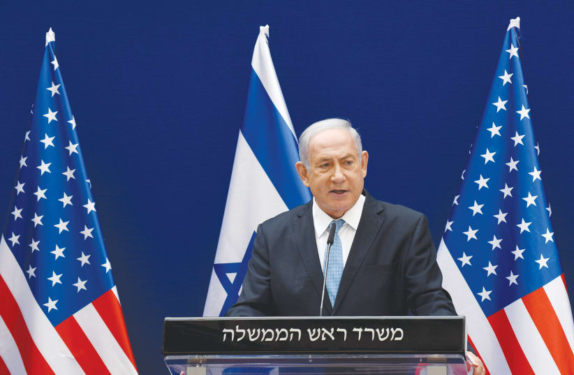 PRIME MINISTER Benjamin Netanyahu speaks about the Israel-UAE peace accords, in Jerusalem last month.  (photo credit: DEBBIE HILL/REUTERS)