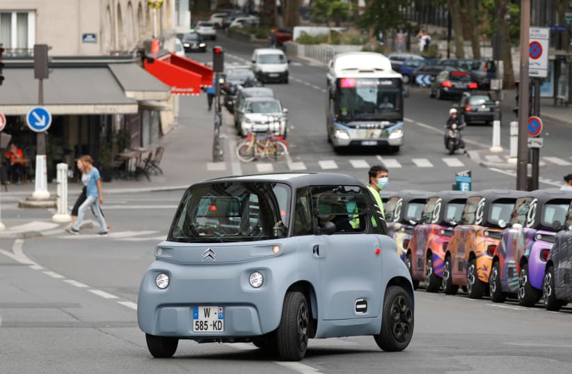 A PSA's Citroen new electric city car AMI is seen during a media presentation in Paris, France, August 25, 2020. (photo credit: CHARLES PLATIAU / REUTERS)
