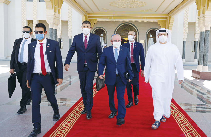 NATIONAL SECURITY Advisor Meir Ben-Shabbat makes his way to board a plane to leave Abu Dhabi, UAE, on September 1. (photo credit: NIR ELIAS / REUTERS)