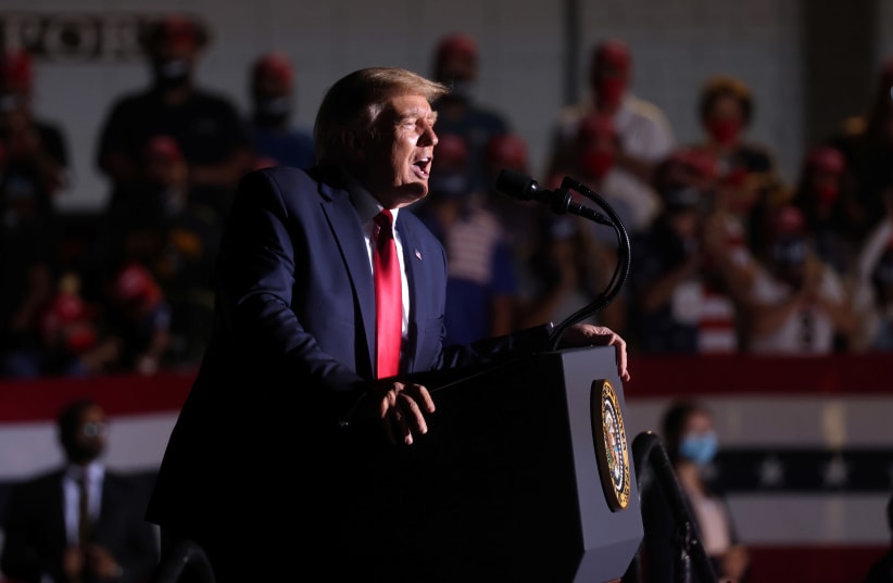 US President Donald Trump rallies with supporters at a campaign rally in Minden, Nevada, September 12, 2020 (photo credit: REUTERS / JONATHAN ERNST)