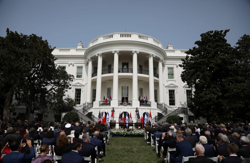 US President Donald Trump speaks as Israel's Prime Minister Benjamin Netanyahu, United Arab Emirates (UAE) Foreign Minister Abdullah bin Zayed and Bahrain’s Foreign Minister Abdullatif Al Zayani listen before the signing of the Abraham Accords. South Lawn of the White House in Washington, US, Septem (photo credit: REUTERS/TOM BRENNER)