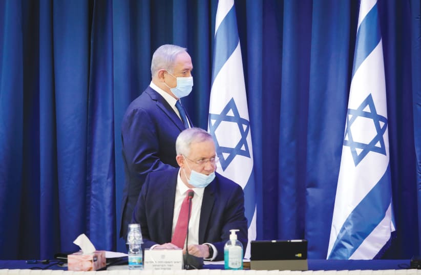 Prime Minister Benjamin Netanyahu and Alternate Prime Minister and Defense Minister Benny Gantz.  (photo credit: MARC ISRAEL SELLEM/THE JERUSALEM POST)