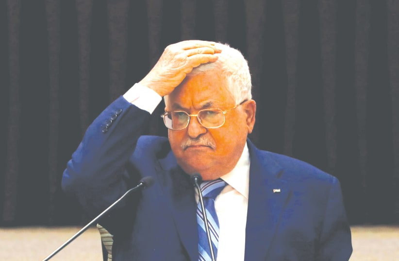 PALESTINIAN AUTHORITY President Mahmoud Abbas gestures during a meeting to discuss the UAE’S deal with Israel to normalize relations, in Ramallah last month. (photo credit: MOHAMAD TOROKMAN/REUTERS)