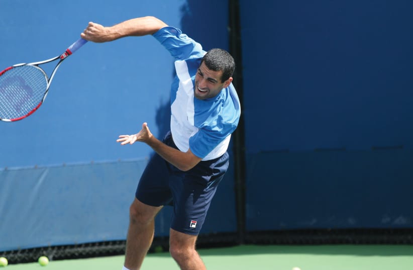 Andy Ram at US Open practice 2009 (photo credit: Wikimedia Commons)