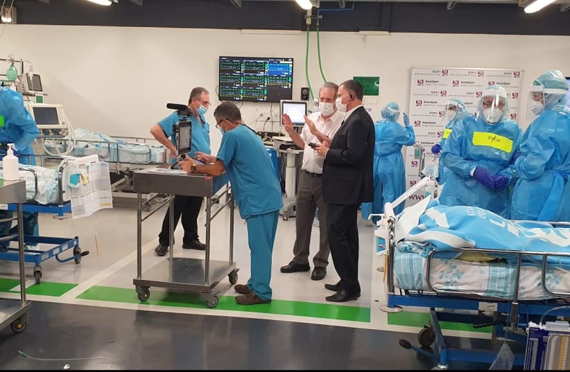 A visit by Health Minister Yuli Edelstein at the Rambam underground medical center during initial preparations, July, 2020. (photo credit: RAMBAM MEDICAL CENTER)