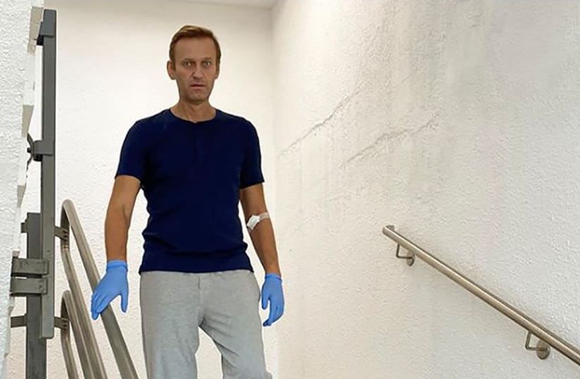 Russian opposition politician Alexei Navalny goes downstairs at Charite hospital in Berlin, Germany, in this undated image obtained from social media September 19, 2020 (photo credit: COURTESY OF INSTAGRAM @NAVALNY/SOCIAL MEDIA VIA REUTERS)