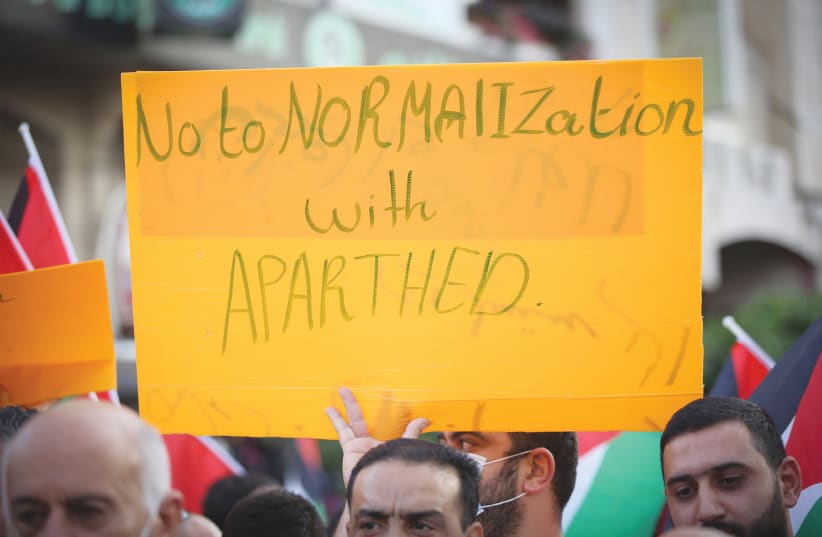 Palestinians protest the recent peace deals struck between Israel, the UAE and Bahrain.  (photo credit: FLASH90)