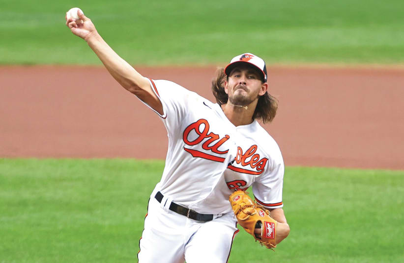 JEWISH PRIDE was certainly on display this year among pro baseball players, with Dean Kremer pitching for the Baltimore Orioles with a Star of David necklace flying. (photo credit: BALTIMORE ORIOLES/COURTESY)