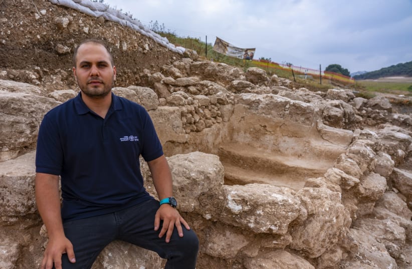 Abd Elghani Ibrahim of the Israel Antiquities Authority, at the site of the excavated mikveh near Kibbutz Hannaton.  (photo credit: YANIV BERMAN/IAA)