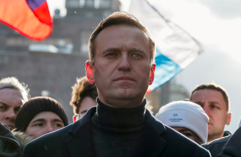 Russian opposition politician Alexei Navalny takes part in a rally to mark the 5th anniversary of opposition politician Boris Nemtsov's murder and to protest against proposed amendments to the country's constitution, in Moscow, Russia February 29, 2020. (photo credit: REUTERS)