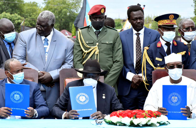 Sudan's Sovereign Council Chief General Abdel Fattah al-Burhan, South Sudan's President Salva Kiir, and Chad President Idriss Deby attend the signing of peace agreement between the Sudan's transitional government and Sudanese revolutionary movements to end decades-old conflict, in Juba, South Sudan  (photo credit: REUTERS/JOK SOLOMUN)