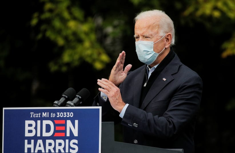 Democratic U.S. presidential nominee Joe Biden speaks about the economy and the coronavirus disease (COVID-19) pandemic during a campaign stop at UFCW (United Food and Commercial Workers) Local 951 in Grand Rapids, Michigan, U.S., October 2, 2020 (photo credit: REUTERS/BRENDAN MCDERMID)