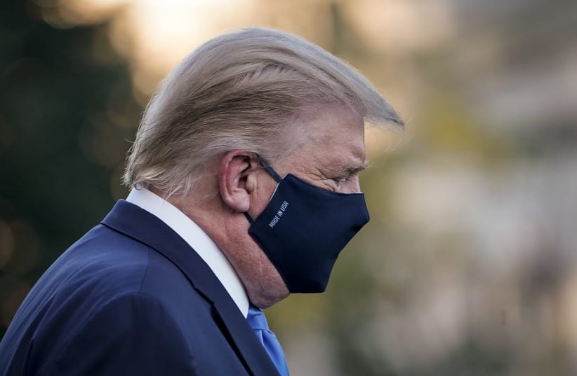After testing positive for COVID-19, President Donald Trump leaves the White House for Walter Reed National Military Medical Center on October 2, 2020. (photo credit: DREW ANGERER/GETTY IMAGES)
