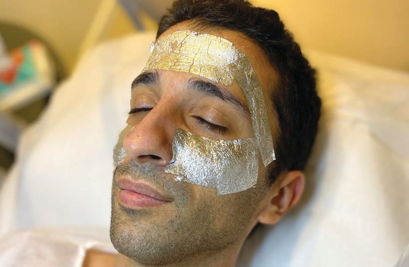 MEN ARE waking up to the importance of taking care of their skin. Pictured: Mimi Luzon silver mask facial. (photo credit: SHARON FEIEREISEN)