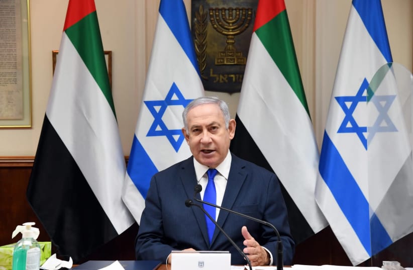 Prime Minister Benjamin Netanyahu speaks as the government approves the peace deal between Israel and the UAE, October 12, 2020 (photo credit: HAIM ZACH/GPO)