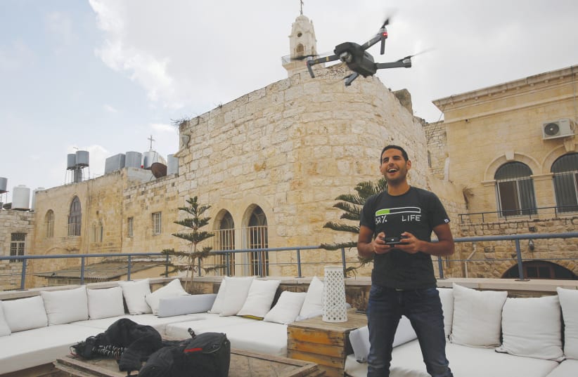 The BDS movement’s current target is the hugely popular Palestinian Arab-Israeli video blogger Nuseir Yassin, who runs the social media site Nas Daily. (photo credit: MUSSA QAWASMA/REUTERS)