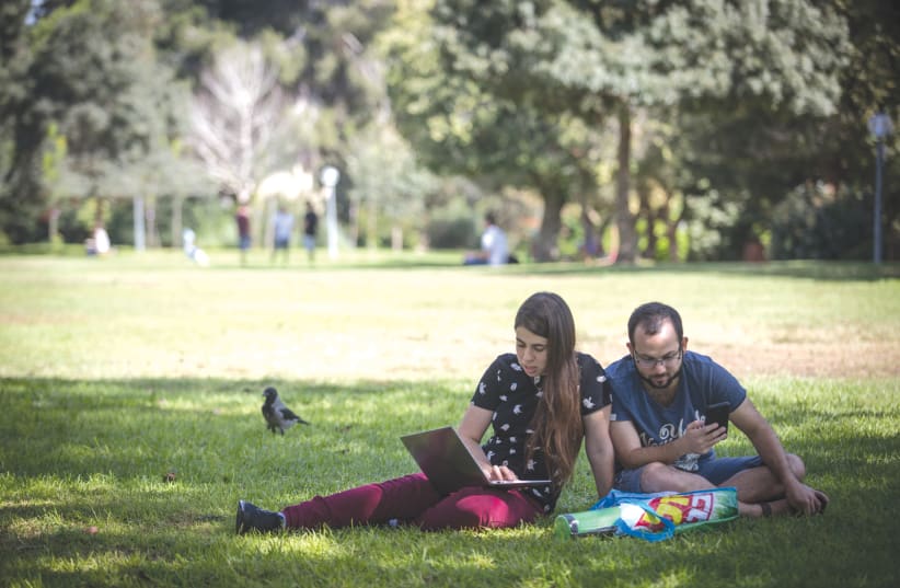 OVERSHADOWED BY heavily funded Orthodox outreach groups, pluralistic options on campus are either small or non-existent. Students at the Hebrew University of Jerusalem study in 2018. (photo credit: HADAS PARUSH/FLASH90)