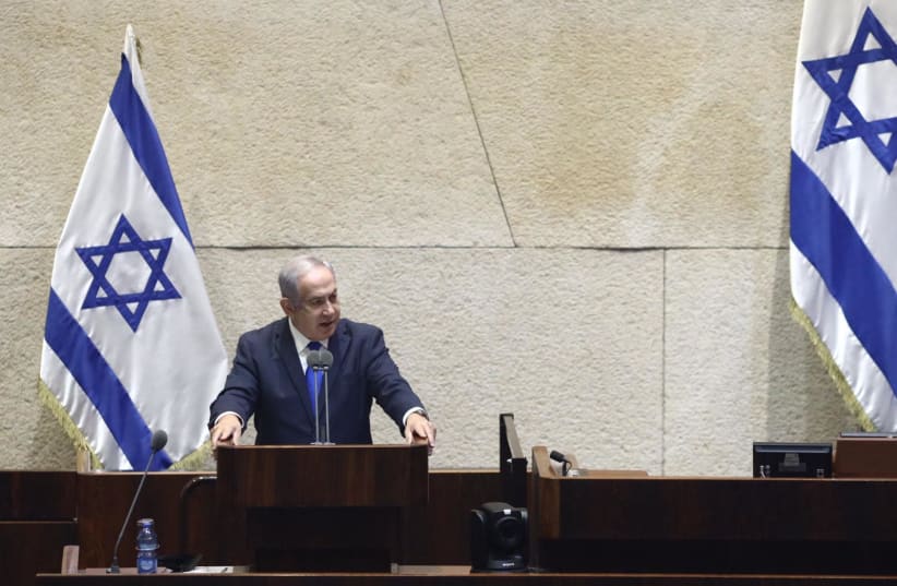 Prime Minister Benjamin Netanyahu speaks at Knesset plenum on Israel-UAE deal (photo credit: GIDON SHARON)