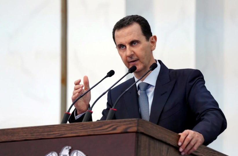 Syria's President Bashar al-Assad addresses the new members of parliament in Damascus, Syria in this handout released by SANA on August 12, 2020 (photo credit: SANA/HANDOUT VIA REUTERS)