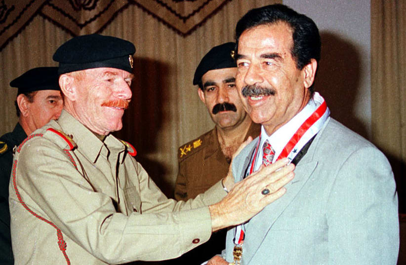 Izzat Ibrahim al-Douri with former Iraqi leader Saddam Hussein (photo credit: REUTERS)