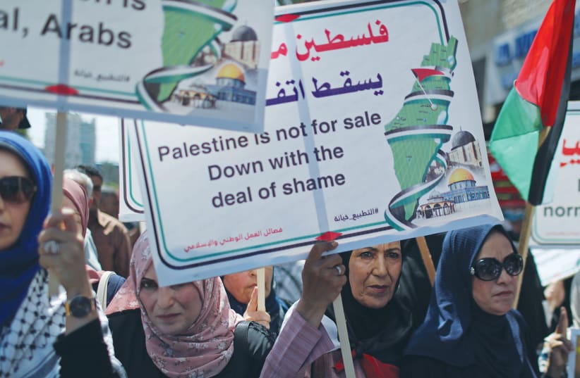 Women in Gaza City protest normalization of relations between the UAE and Israel, in August, 2020. (photo credit: REUTERS)
