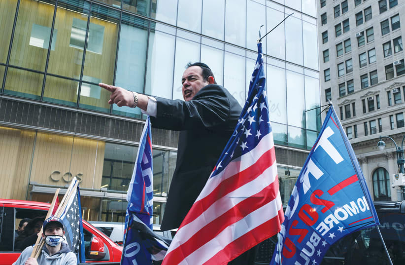 NEW YORK Jewish activist Heshy Tischler and other supporters of US President Donald Trump rally in Manhattan last weekend. (photo credit: YUKI IWAMURA/REUTERS)