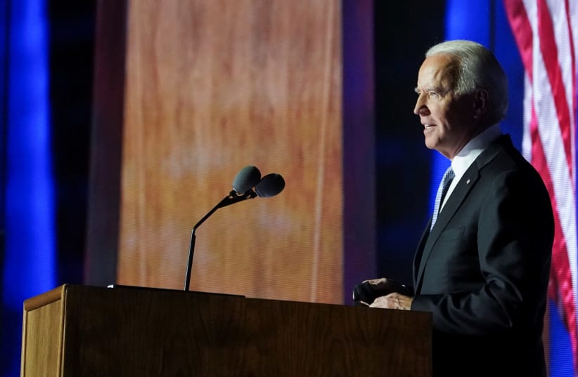 Democratic 2020 US presidential nominee Joe Biden speaks at his election rally, after news media announced that Biden has won the 2020 U.S. presidential election, in Wilmington, Delaware, US, November 7, 2020 (photo credit: KEVIN LAMARQUE/REUTERS)