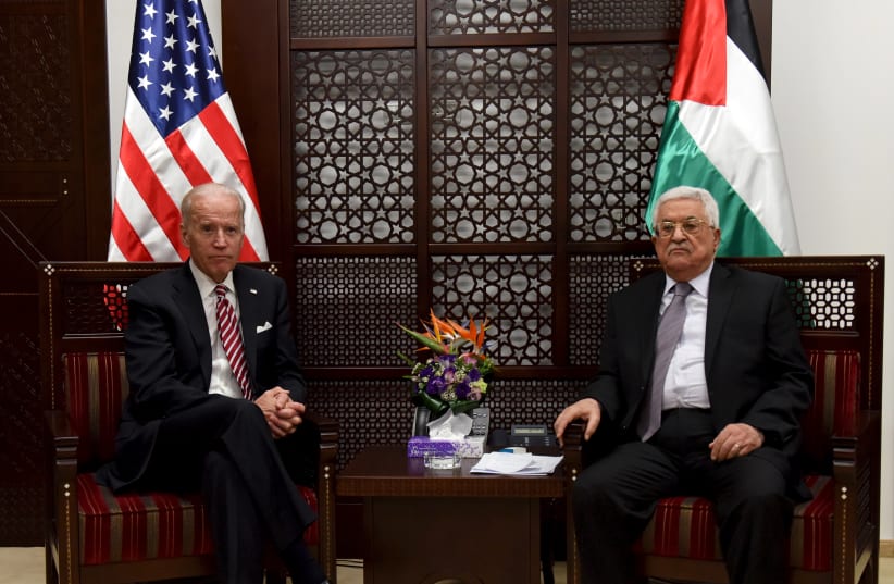 Then US Vice-President Joe Biden (L) meets with Palestinian President Mahmoud Abbas in the West Bank city of Ramallah March 9, 2016 (photo credit: REUTERS/DEBBIE HILL/POOL)