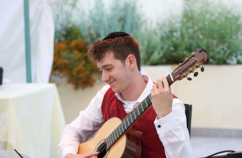 BELGIUM-BORN David Frankel, guitarist and Ohalecha musical director, ‘fell deeply in love’ with Israel (photo credit: MARCO JONA)