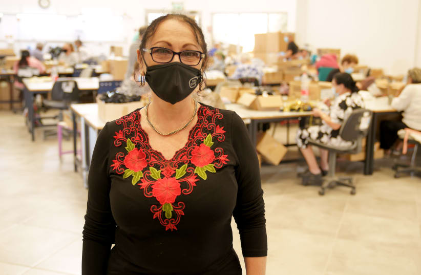 Svetlana Grosha, who oversees the wellbeing of those who work at the "factory." "We have everyone here," she says. (photo credit: GABY MOATTY)