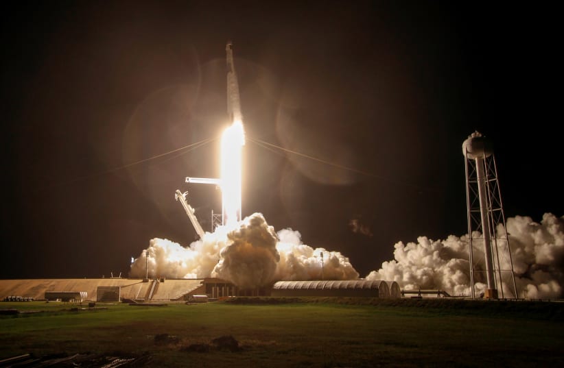 NASA and SpaceX launch the first operational commercial crew mission (photo credit: REUTERS)