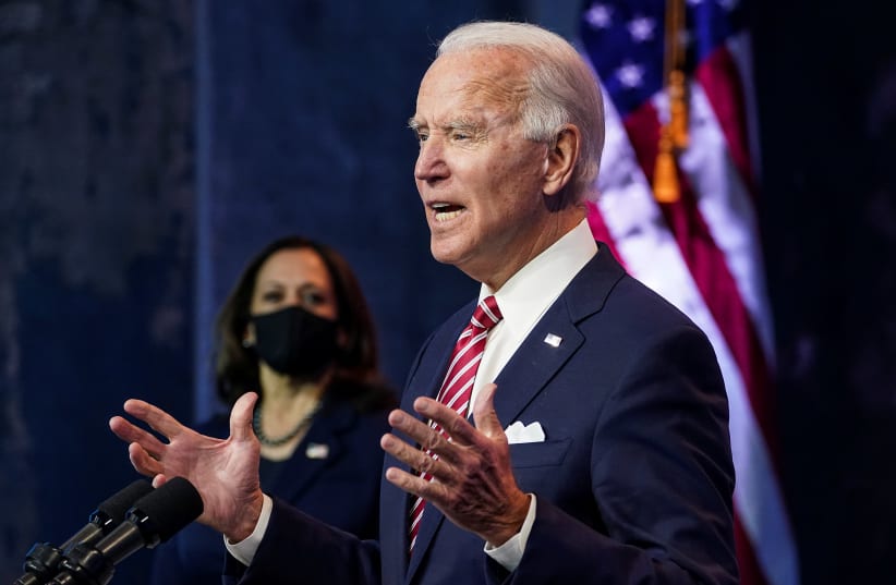 US President-elect Joe Biden speaks about the US economy as Vice President-elect Kamala Harris stands by, Wilmington, Delaware, US, November 16, 2020. (photo credit: REUTERS/KEVIN LAMARQUE)