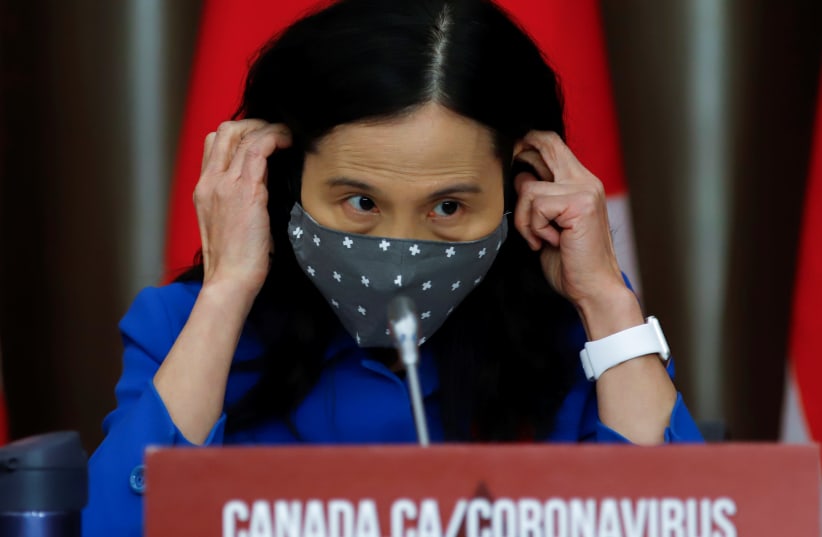 CANADIAN CHIEF Public Health Officer Dr. Theresa Tam masks up at a news conference in Ottawa on November 6. (photo credit: PATRICK DOYLE)