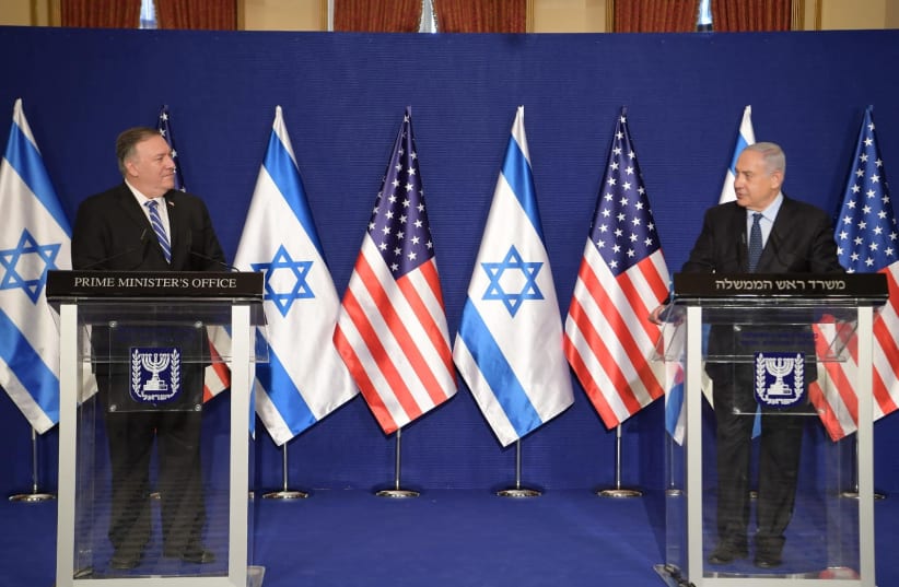 US Secretary of State Mike Pompeo and Israeli Prime Minister Benjamin Netanyahu speak at a joint news conference in Jerusalem, November 19, 2020. (photo credit: AMOS BEN-GERSHOM/GPO)