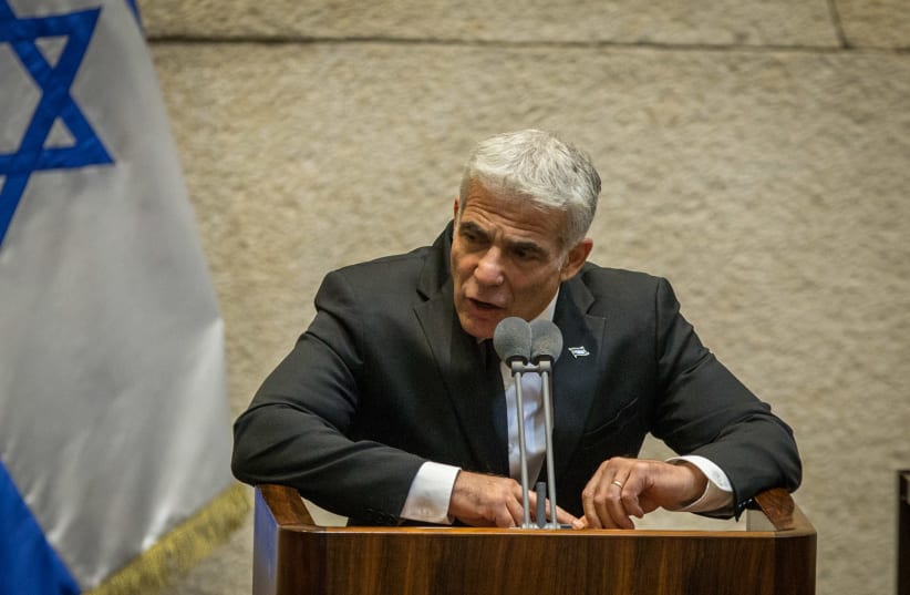 MK Yair Lapid speaks during a Knesset plenary session at the Knesset, the Israeli parliament in Jerusalem on August 24, 2020. (photo credit: OREN BEN HAKOON/POOL)