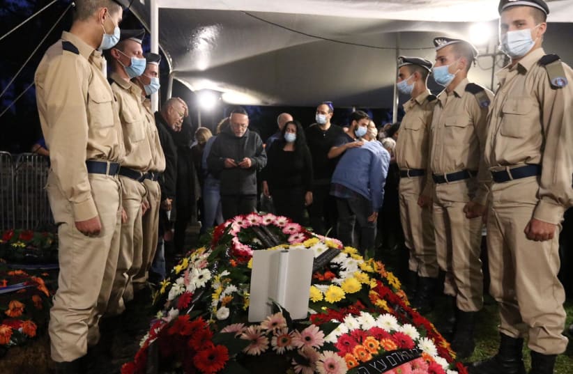 Family and friends attend the funeral of Corporal Lihu Ben-Bassa, 19, at the military cemetery in Rishon Lezion, Nov. 25, 2020. (photo credit: ALONI MOR)