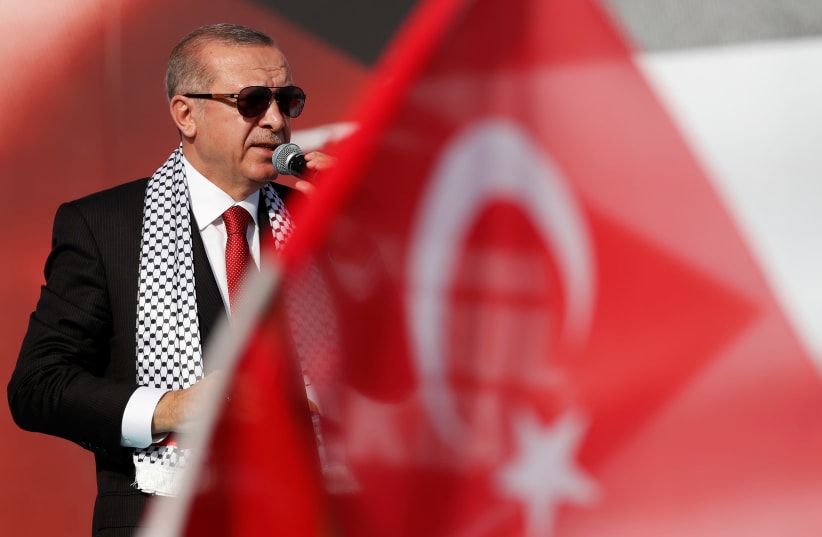 Turkish President Tayyip Erdogan delivers a speech during a protest against the recent killings of Palestinian protesters on the Gaza-Israel border and the US embassy move to Jerusalem, in Istanbul, Turkey May 18, 2018 (photo credit: REUTERS/MURAD SEZER)