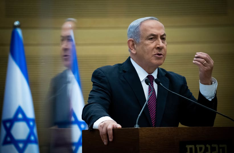 Prime Minister Benjamin Netanyahu speaking at the Knesset, December 2, 2020 (photo credit: YONATHAN SINDEL/FLASH90)