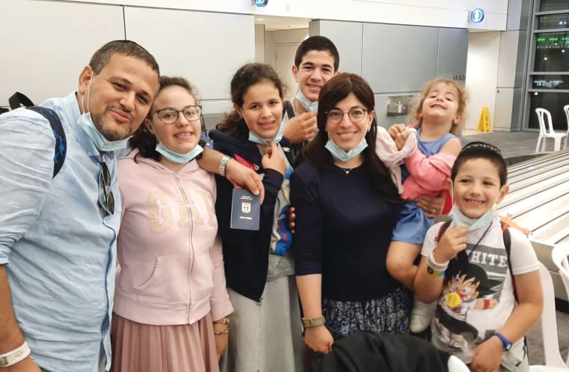 DR. CHAVA TAMIM and family are all smiles upon arrival in Israel.  (photo credit: Courtesy)