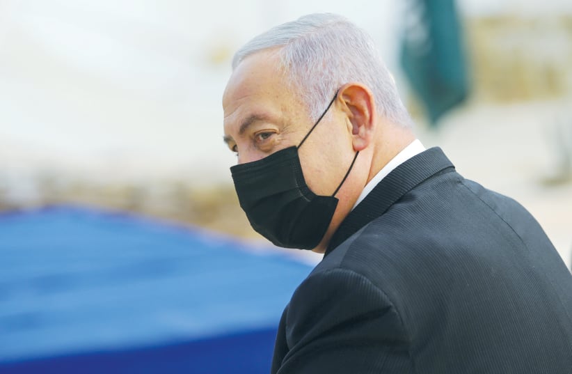 Prime Minister Benjamin Netanyahu attends the opening ceremony for the Sha’ar Hagai Memorial on the road to Jerusalem on November 29. (photo credit: ALEX KOLOMOISKY/POOL/VIA REUTERS)