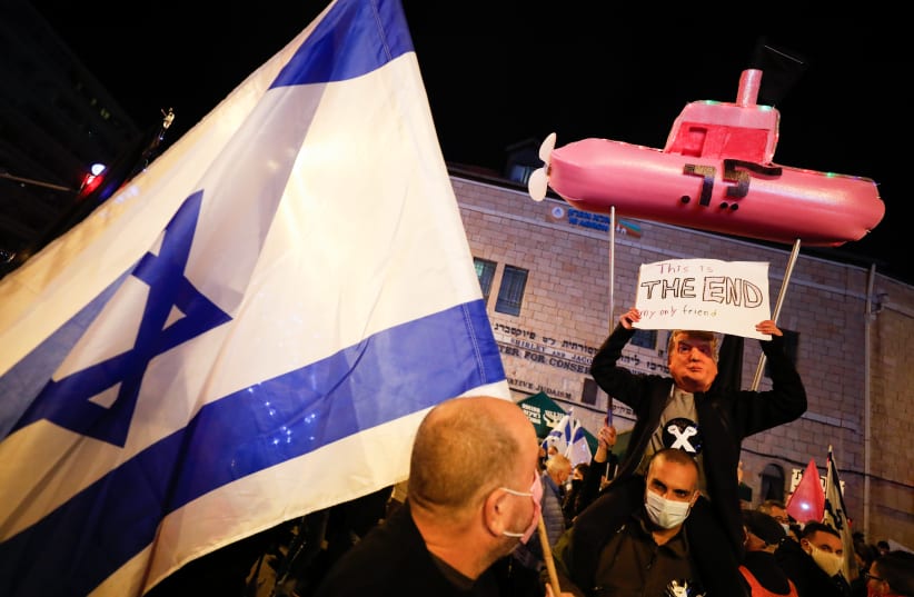 Israelis protest against Israeli prime minister Benjamin Netanyahu, in Jerusalem, on December 05, 2020. (photo credit: OLIVIER FITOUSSI/FLASH90)