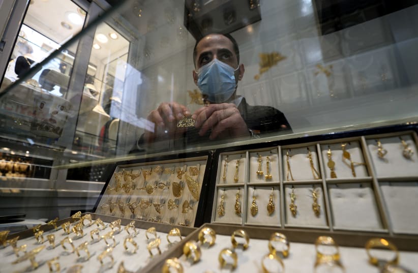 Gaza jeweller struggles to sell Christmas gold (photo credit: REUTERS)