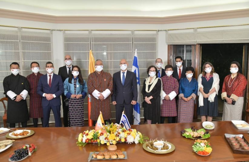 Israeli Ambassador Ron Malka, Bhutanese Ambassador Vetsop Namgyel, and delegations. December 12, 2020 (photo credit: ISRAELI EMBASSY IN NEW DELHI)