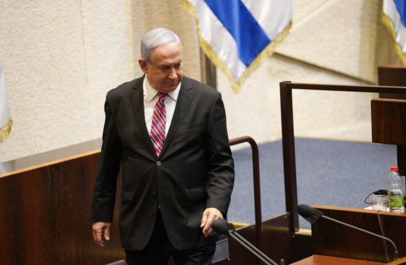 Prime Minister Benjamin Netanyahu at the Knesset, as it disperses, sending Israel into elections in March, December 22, 2020.  (photo credit: KNESSET SPOKESPERSON/DANI SHEM TOV)