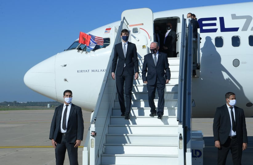 White House senior adviser Jared Kushner (L) and Israel's National Security Adviser Meir Ben-Shabbat are seen in Rabat disembarking from the first direct El Al flight from Israel to Morocco on December 22, 2020. (photo credit: AMOS BEN-GERSHOM/GPO)