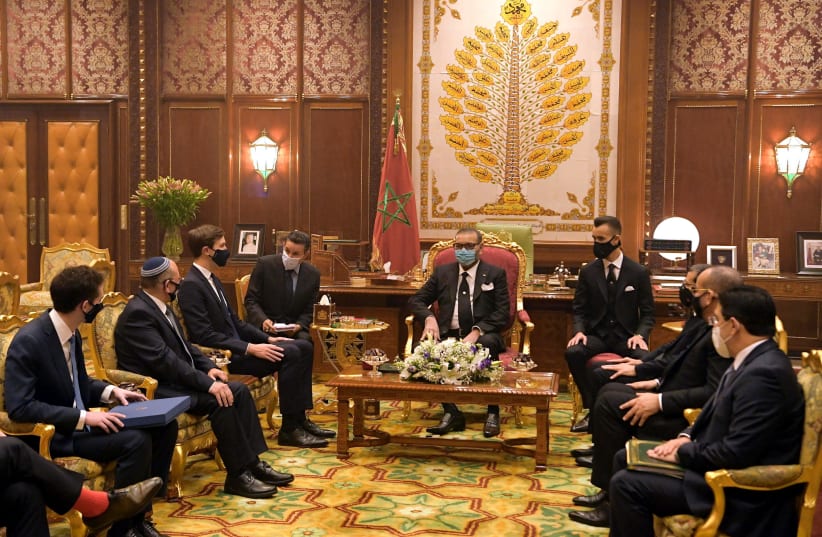 Meir Ben Shabbat and Jared Kushner meet with King Mohammed VI of Morocco (photo credit: AMOS BEN GERSHOM, GPO)