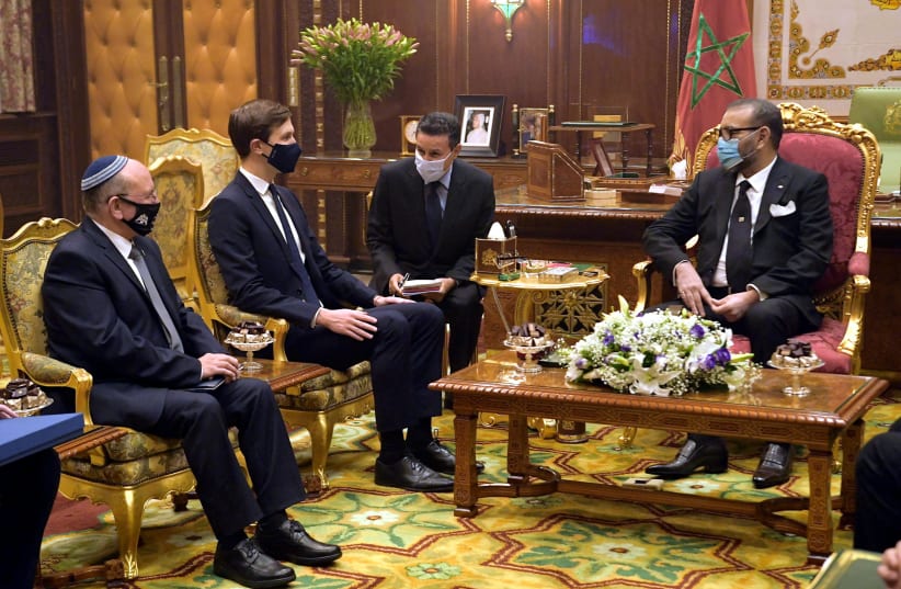 Meir Ben Shabbat and Jared Kushner meet with King Mohammed VI of Morocco (photo credit: AMOS BEN GERSHOM, GPO)