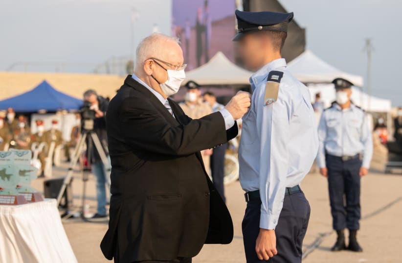 President Reuven Rivlin attends the graduation ceremony of Israel's 181 IAF flying training course on Wednesday, December 23, 2020. (photo credit: IDF SPOKESPERSON'S UNIT)